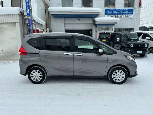 ホンダ フリード　ハイブリッド １．５ ハイブリッド クロスター ホンダセンシング ４ＷＤ R3年 (北海道) 99