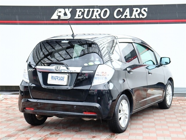 ホンダ フィット　ハイブリッド １．３ ナビプレミアムセレクション H22年 (関東) 99