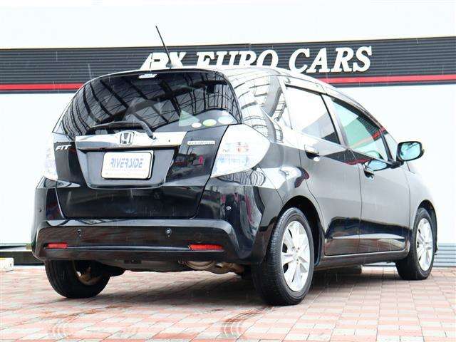 ホンダ フィット　ハイブリッド １．３ ナビプレミアムセレクション H22年 (関東) 99