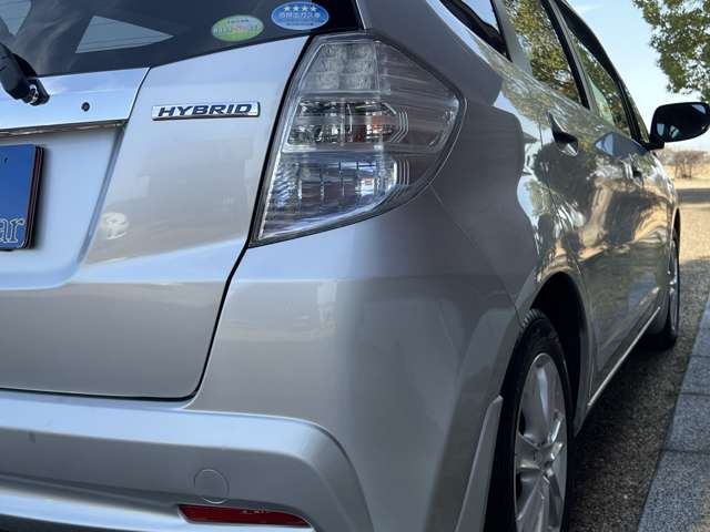 ホンダ フィット　ハイブリッド １．３ ナビプレミアムセレクション H23年 (近畿) 99