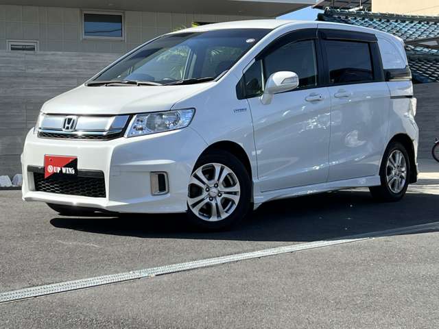 ホンダ フリードスパイク　ハイブリッド １．５ ジャストセレクション H26年 (近畿) 99