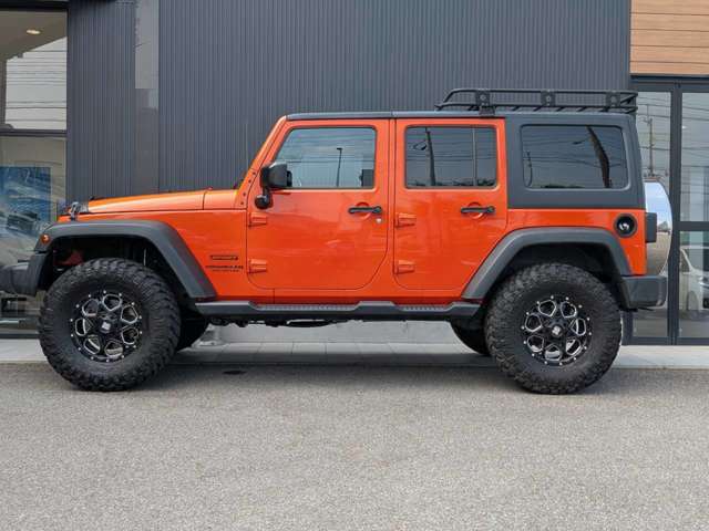 ジープ ラングラー　アンリミテッド アンリミテッド サンセット オレンジ ４ＷＤ H27年 (四国) 99