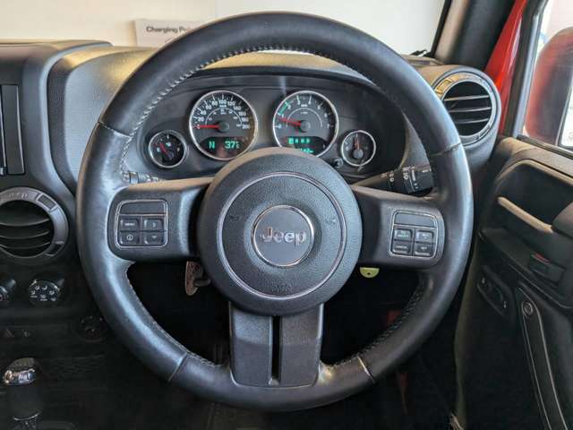 ジープ ラングラー　アンリミテッド アンリミテッド サンセット オレンジ ４ＷＤ H27年 (四国) 99