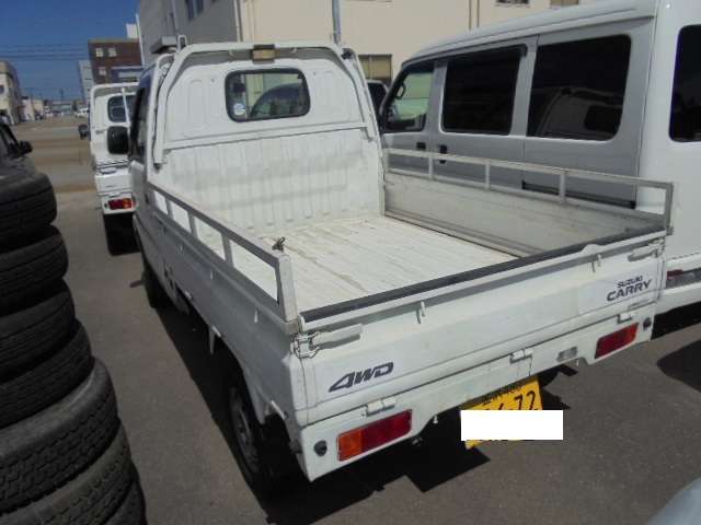 スズキ キャリイトラック ６６０ ＫＵスペシャル ３方開 ４ＷＤ H26年 () 99