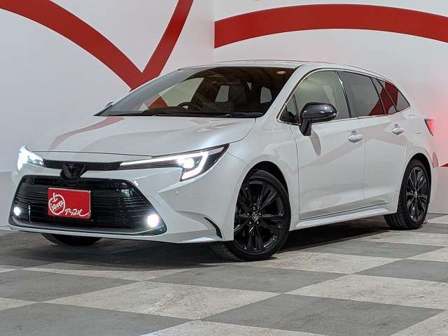 トヨタ カローラ　ツーリング　ハイブリッド １．８ ハイブリッド ＷＸＢ Ｅ－ＦＯＵＲ ４ＷＤ R6年 () 99