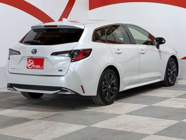 トヨタ カローラ　ツーリング　ハイブリッド １．８ ハイブリッド ＷＸＢ Ｅ－ＦＯＵＲ ４ＷＤ R6年 () 99