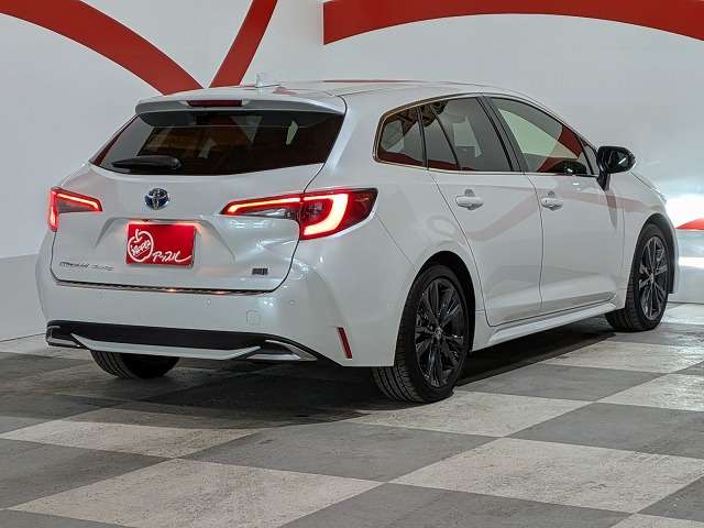 トヨタ カローラ　ツーリング　ハイブリッド １．８ ハイブリッド ＷＸＢ Ｅ－ＦＯＵＲ ４ＷＤ R6年 () 99