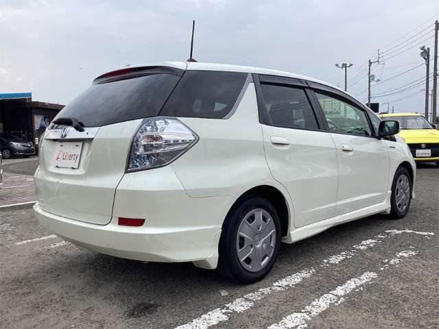 ホンダ フィット　シャトル　ハイブリッド １．３ スマートセレクション H24年 (四国) 99