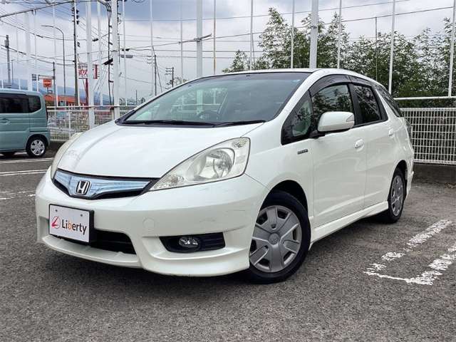 ホンダ フィット　シャトル　ハイブリッド １．３ スマートセレクション H24年 (四国) 99