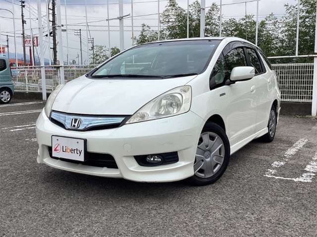 ホンダ フィット　シャトル　ハイブリッド １．３ スマートセレクション H24年 (四国) 99