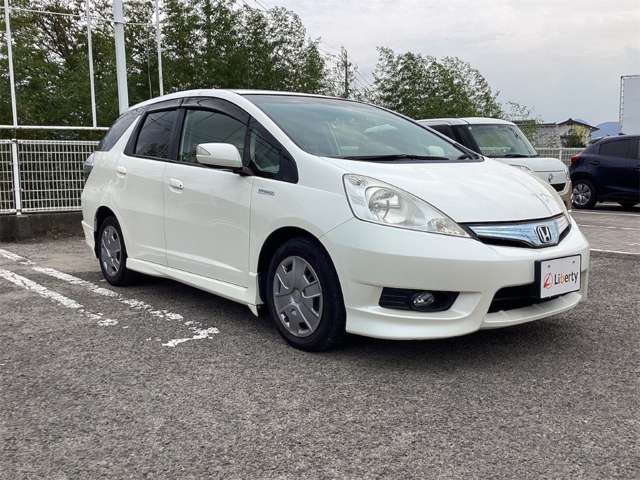 ホンダ フィット　シャトル　ハイブリッド １．３ スマートセレクション H24年 (四国) 99