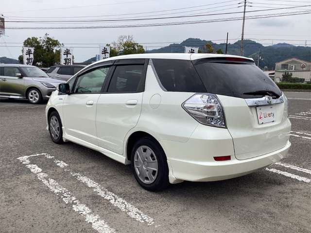 ホンダ フィット　シャトル　ハイブリッド １．３ スマートセレクション H24年 (四国) 99