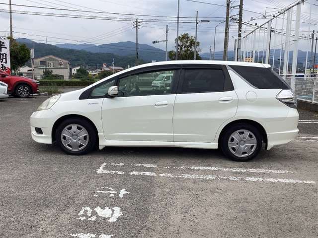 ホンダ フィット　シャトル　ハイブリッド １．３ スマートセレクション H24年 (四国) 99