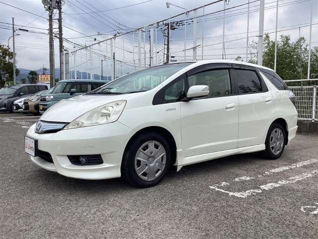 ホンダ フィット　シャトル　ハイブリッド １．３ スマートセレクション H24年 (四国) 99
