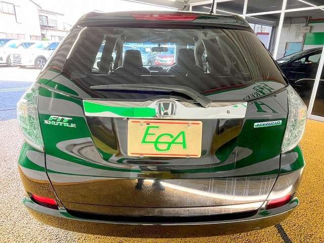 ホンダ フィット　シャトル　ハイブリッド １．３ ナビプレミアムセレクション H23年 () 99